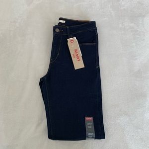 LEVI MID RISE SKINNY JEANS